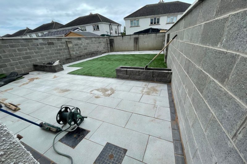 Patio with Newgrange Granite Flags, Rockface Flowerbeds and Artificial Grass in Rathangan, Co. Kildare (3)
