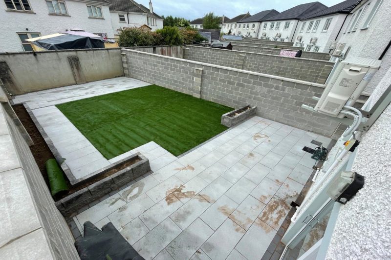Patio with Newgrange Granite Flags, Rockface Flowerbeds and Artificial Grass in Rathangan, Co. Kildare (6)